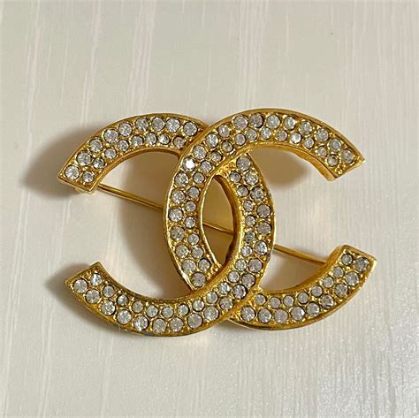 black chanel pin|vintage Chanel pin.